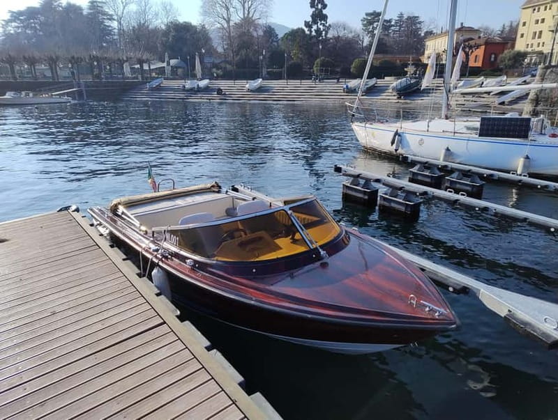 Como: Wooden Boat Private Tour with Winter Cover and Skipper - Winter cover, cushions, and sunset lighting: staying comfortable on the water