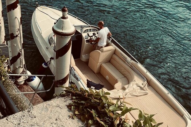 Full-Day Grand Tour, private speedboat at Lake Como - The Como start: Volta monument, Villa Olmo, and big villa views