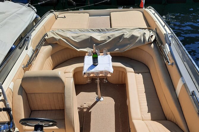 Full-Day Grand Tour, private speedboat at Lake Como - On board: comfort, bathroom, and included food/drink